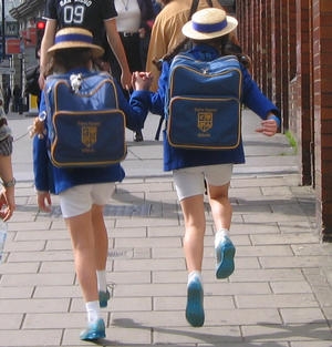 Skipping Schoolgirls outside Victoria Station, London